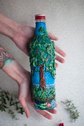 decorative alcohol bottle, bottle collecting, decorated bottle, papier mache bottle, embossed buttle, nature scenary