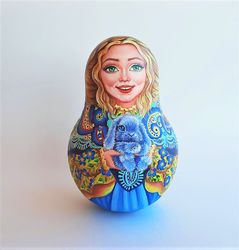 Girl with plush hare toy Russian roly-poly music ringing doll hand painted