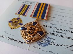 UKRAINIAN AWARD MEDAL "FOR EFFECTIVE COOPERATION" WITH DOCUMENT. GLORY TO UKRAINE