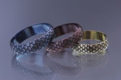 Titanium ring with scales