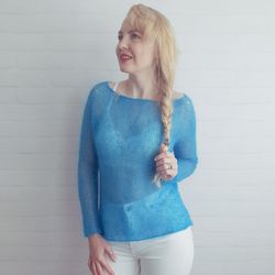 Gentle bright elegant knitted jumper made of blue Italian mohair and lurex.