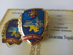 UKRAINIAN BADGE "DEFENDER OF UKRAINE. NATIONAL GUARD". PARTICIPANT OF THE COMBAT ACTIONS. GLORY OF UKRAINE