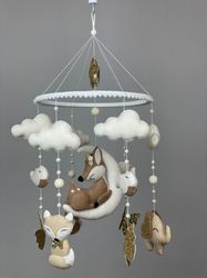 nursery mobile in a crib