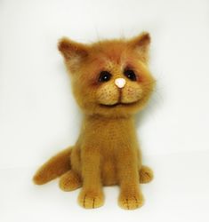 Stuffed ginger realistic cat