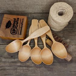Handmade wooden spoon from natural maple wood with comfortable handle for eating