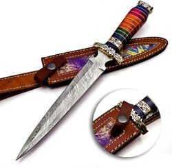 Dagger made by hand with Damascus steel and a collectible camel bone handle with brass inserts (multi wood) with leather