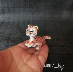 Miniature baby tiger Ural