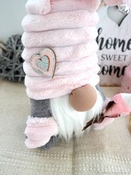 Pink plush gnome stuffed doll with bird