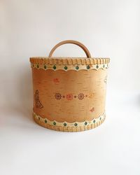 Bread box made of birch bark, with floral ornaments and carvings for the kitchen