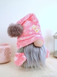 Pink gnome stuffed doll with heart