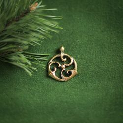 Triskele pendant on black leather cord. Triskelion necklace. Pagan handcrafted sacred sign jewelry. Celtic style