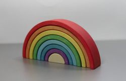 Varicolored rainbow of 8 element. Beech wood toy Puzzle for toddler