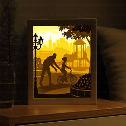 Father Teaching Son To Ride A Bike Shadow Box SVG, Light Box Template, Paper Cut Template