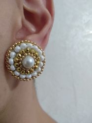 Round clip-on earrings with white pearls and gold beads beadwork. Gold disk earring. Seed beaded jewelry. Gift for mom.