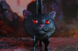 Magic cat magnet / black with red eyes