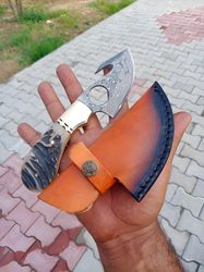 The Perfect Combination: Handmade Damascus Gut Hook Knife with a Stag Antler Handle and Leather Sheath