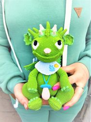 Baby Dragon with pacifier. Funny baby dragon toy amigurumi crocheted. Green dragon soft toy handmade. Cute plush dragon