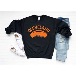 vintage cleveland football cityscape unisex black sweatshirt, go cleveland football team shirt, american football shirt,