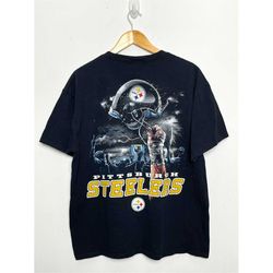 Early 2000s NFL Football Pittsburgh Steelers Lightning Helmet Graphic Tee Shirt (size adult XL)