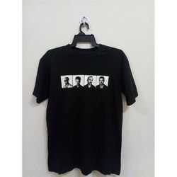 Vintage u2 rock band t shirt pmartp tour 1997 size L under lacense to polygram merchandising rock band.. vintage t shirt