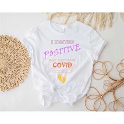 i tested positive but not for covid tee, pregnancy announcement t-shirt, pregnant t-shirts, baby announcement gift, t-sh