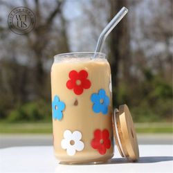 https://www.inspireuplift.com/resizer/?image=https://cdn.inspireuplift.com/uploads/images/seller_products/1686220062_MR-862023182736-daisy-cup-iced-coffee-cup-glass-4th-of-july-can-glass-image-1.jpg&width=250&height=250&quality=80&format=auto&fit=cover
