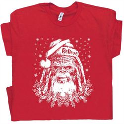 Bigfoot Santa Claus T Shirt Funny Christmas Shirts Christmas Vacation Shirt For Men Women Sasquatch Wearing Santa Hat Te