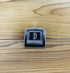 Datsun 120Y Steering Emblem