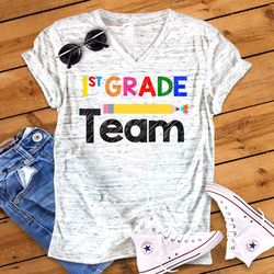 1st Grade Team Back To School First Grade Teacher Novelty Graphic Unisex V Neck Graphic Tee T-Shirt