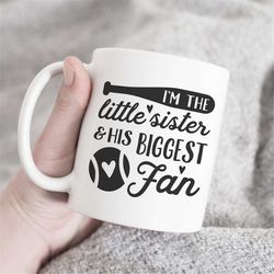 I'm the little sister and his biggest fan mug, football sister mug, baseball sister mug, baseball brother mug, brother m