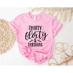 Thirty Flirty & Thriving T-Shirt, 30th Birthday Shirt, 30 AF Shirts, 90s Baby Outfit, Birthday Trip T-Shirts, Funny Thir