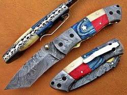 Remarkable handmade Damascus steel folding knife,
