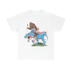Bigfoot Riding Dinosaur USA Flag 4th Of July America T-shirt