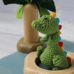 green crochet dinosaur crochet animal amigurumi toy