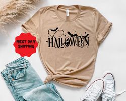 Funny Halloween Shirt, Perfect for Halloween Parties, Gifts, and Costumes! Women's and Kids' Halloween Shirt with Playfu