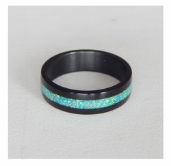 Stylish black ring. Carbon ring with synthetic opal. 9 1/4
