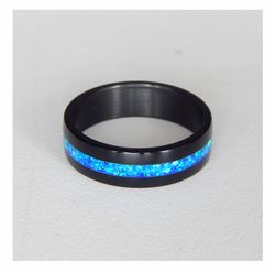 Stylish black ring. Carbon ring with synthetic opal. 10 1/2