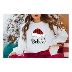 Believe Shirt. Merry Christmas Sweatshirt UNISEX Adult. Happy Holidays Shirt. Funny Xmas Gift Women  Men. Santa Hat.