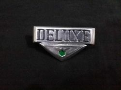 DELUXE Emblem In Metal