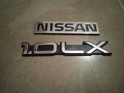 Nissan With 1.0LX Emblem for 1996 Model Pair of 2 Piece