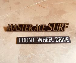 MASTER ACE SURF With Front Wheel Drive Emblem 2 Piece