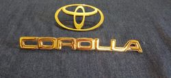Toyota LOGO And Corolla Emblem In Gold Metal
