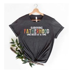 Surviving Fatherhood One Beer At A Time Shirt, Best Dad Shirt,Best Dad Gift, Fathers Gift, Husband Gift, Funny Dad shirt