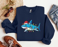 santa shark light christmas shirt, santa hat shark christmas sweatshirt.jpg