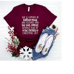She Is Clothed In Buffalo Plaid And Leggings, Family Christmas Shirts, Christmas Shirts For Women, Women's Christmas Shi