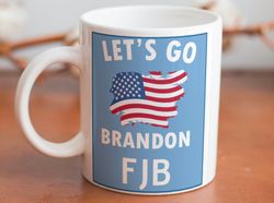 Funny Coffee mug stating Lets Go Brandon