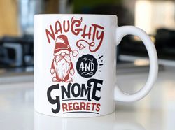 Funny Gnome Christmas coffee mug stating, Naughty And Gnome Regrets