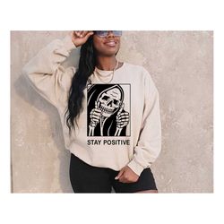 Stay Positive Skeleton Sweatshirt Gift For Halloween, Spooky Grim Reaper Hoodie, Horror Skull Apparel, Creepy Halloween