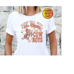 Raisin' Hell With The Hippies And The Cowboys, Howdy Western Shirt, Country Music Shirt, Southern Cowboy Shirt, Vintage