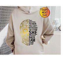 They Whispered Her Cannot Withstand The Storm Hoodie, She Whispered I Am The Storm Hoodie, Skull Hoodie, Inspirational H
